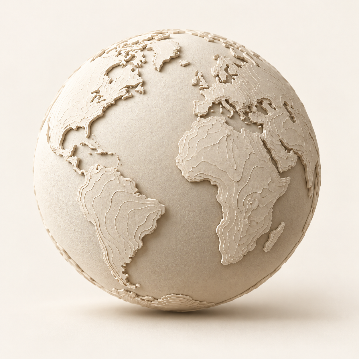 Sculpted ivory globe with raised continents